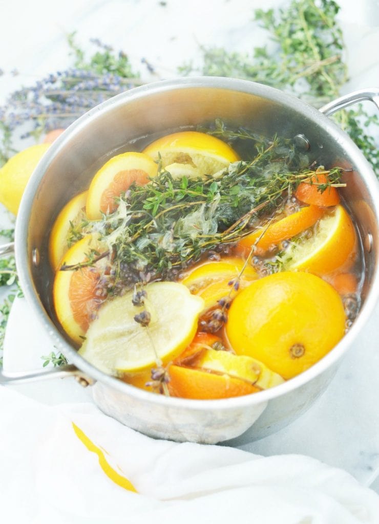 https://www.getgreenbewell.com/wp-content/uploads/2019/02/Boiling-stovetop-potpourri-recipe-orange-lemon-lavender-simmer-pot-air-freshener-740x1024.jpg