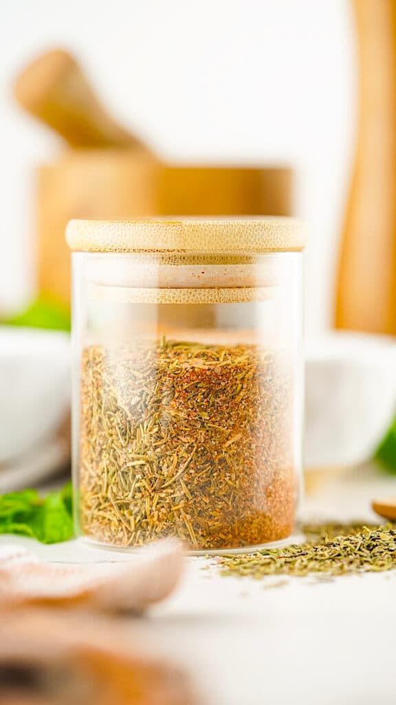 Turkey Rub in a sealed clear jar on a white table